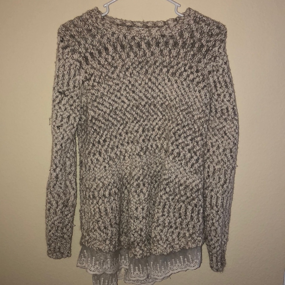 Beautiful sweater with lace at the bottom